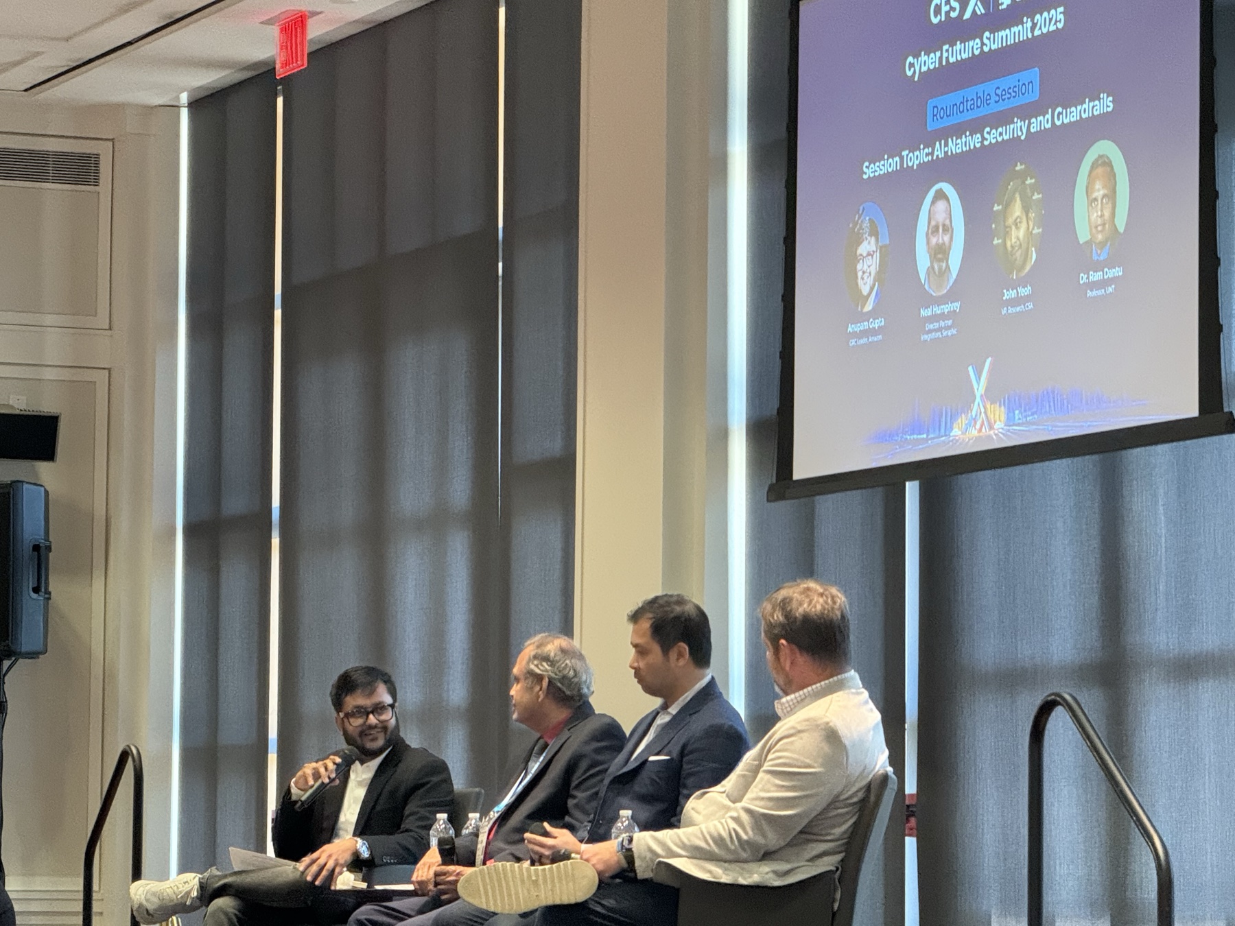 Anupam Gupta moderating an AI-native security and guardrails session with industry leaders at Cyber Future Summit 2025